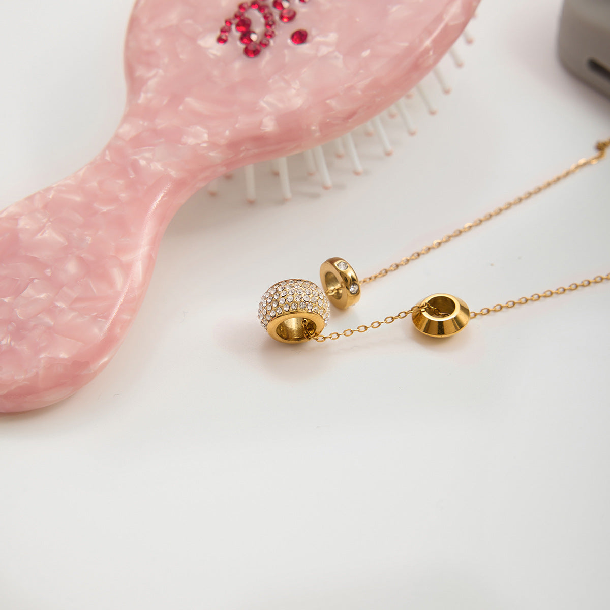 316L Crystal Bead Necklace styled flat lay