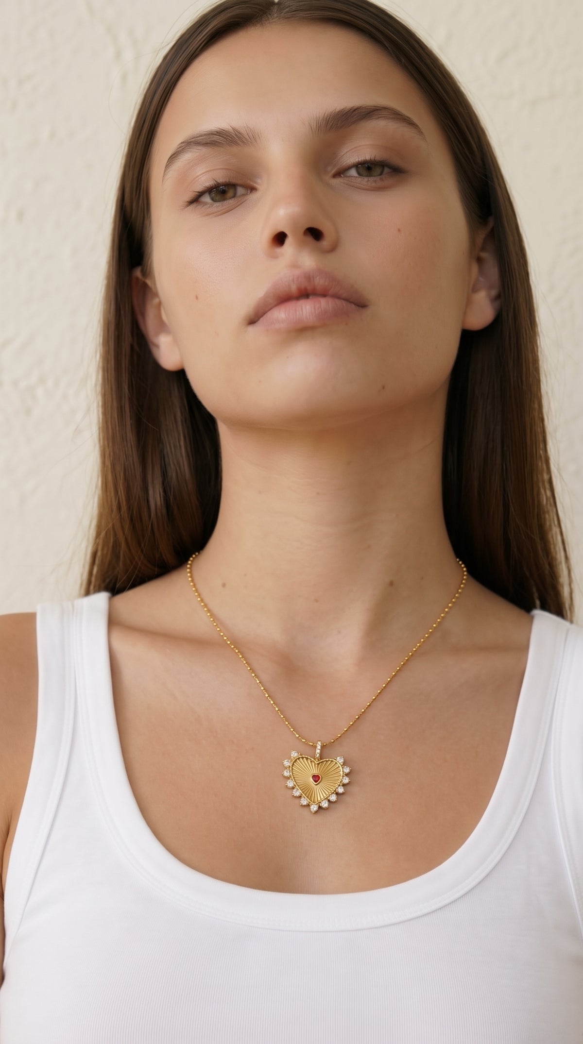 Radiant Heart Necklace — 顔を少し上げた白いトップスでのAI着用イメージ